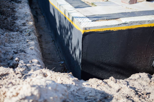 Professional Waterproofing technician working in Parkville, MD
